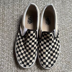 Vans Black and Cream Checkered Slip-On Sneakers